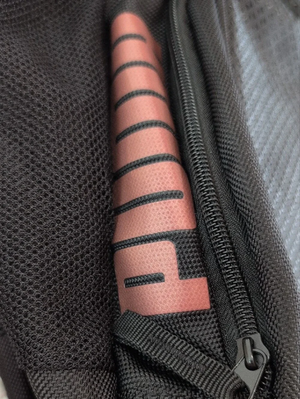Puma Black Backpack with Coral Logo Accent